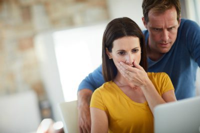 Image of a woman experience sticker shock.