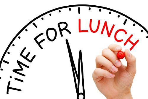 Graphic depicting a clock saying it is time for a lunch break, the topic of many a company policy.