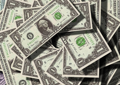 Piles of money denoting the potential monetary size of the custom installation market.