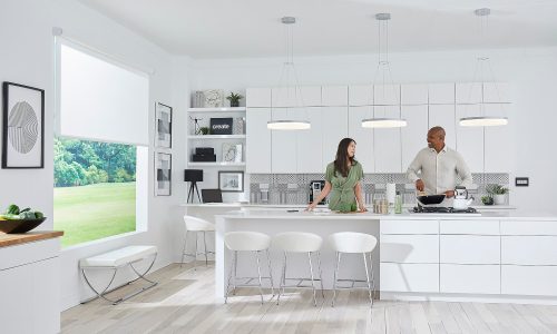 Interior shot of a kitchen featuring the Vantage LHUMAN human centric lighting system alongside Legrand Shading System solutions to highlight the company offerings for Lightapalooza 2023.