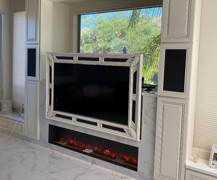 The installed Samsung The Frame TV with custom MantelMount pulldown mount.