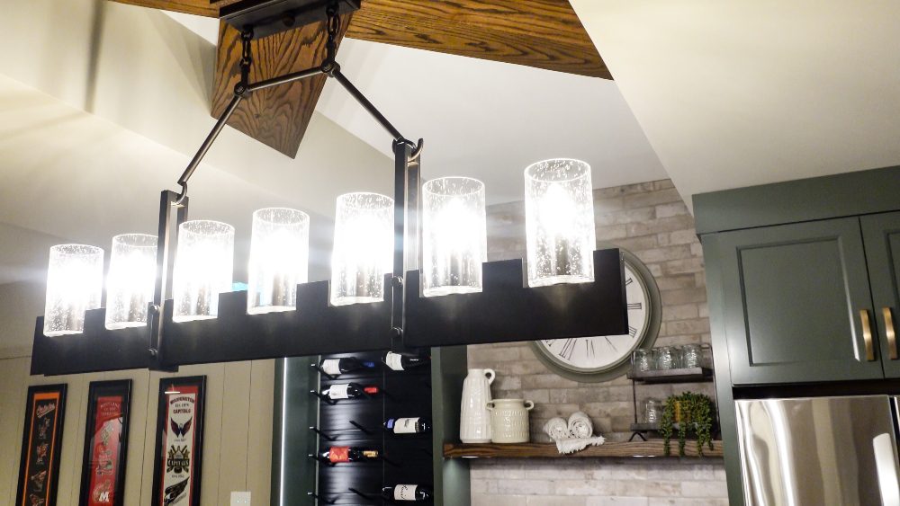 Gramophone Revitalizes Basement as a Sports-Themed Entertainment Room, slide 4