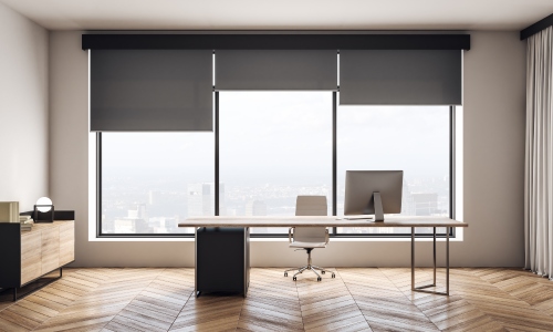Motorized shades in office representing Somfy-powered shades Works with Well