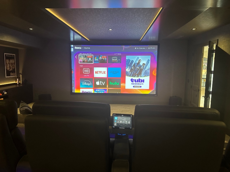 Home theater projection theater in The Cameron Model Smart Home by Intellitech Systems and Sapphire