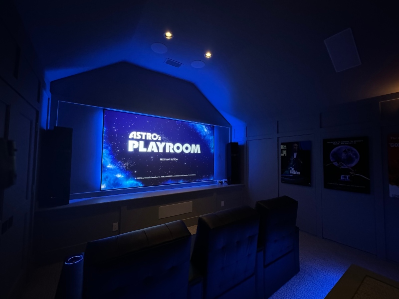 Custom gaming room set-up with blue backlit Screen Innovations projector screen by Advanced Integrated Controls AIC Bluffton South Carolina
