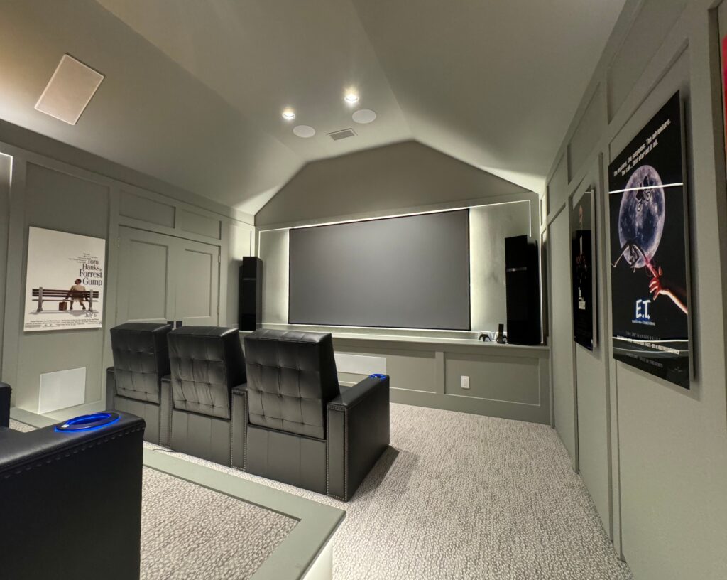 Ketra backlit Screen Innovations projector screen in modern home theater and gaming room Bluffton South Carolina