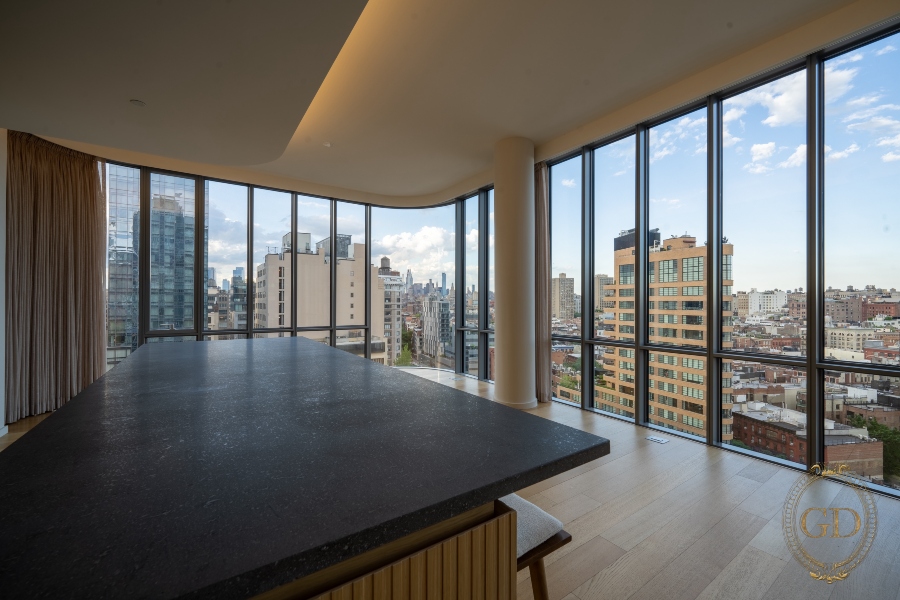 Thick stone countertop overlooking New York City neighborhood in SoHo luxury apartment