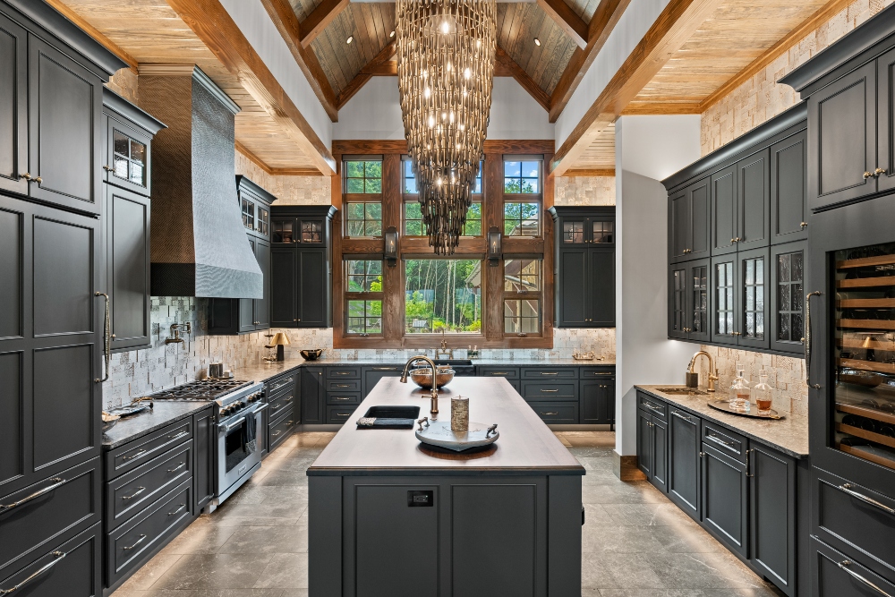Bright regal kitchen with golden overhead chandelier and dark wood cabinets against bright tiled backsplash
