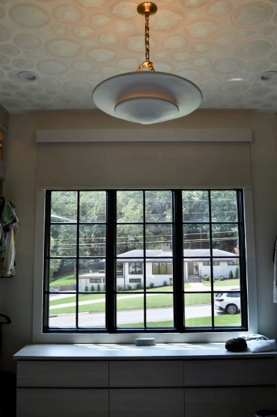 French door window looking out onto sunny neighborhood in Huntsville Alabama