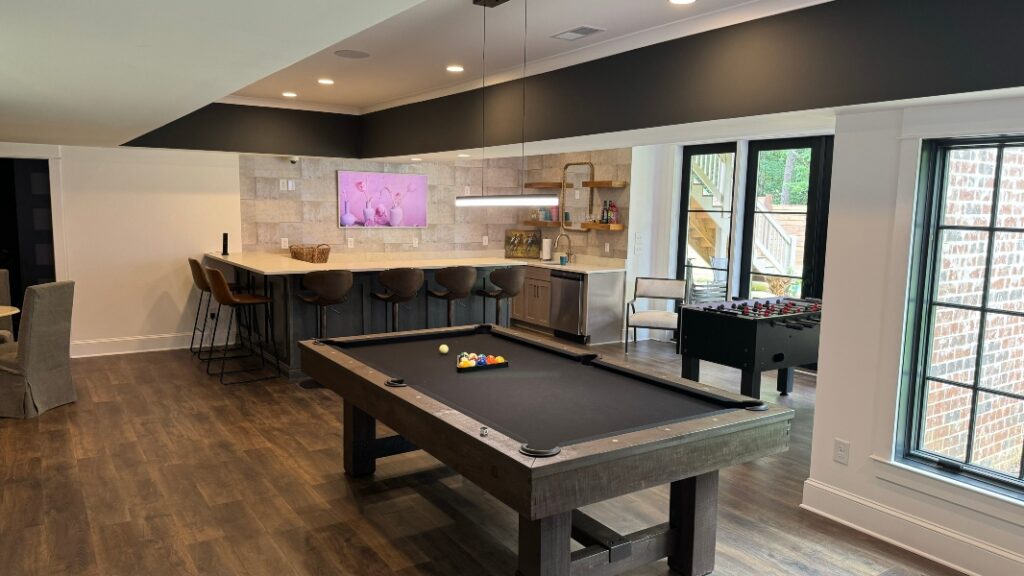 Media Room and Cocktail Bar in Birmingham Alabama Home with technology design done by Innovative Sight and Sound