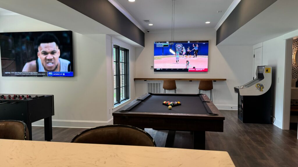 Media Room and Cocktail Bar in Birmingham Alabama Home with technology design done by Innovative Sight and Sound